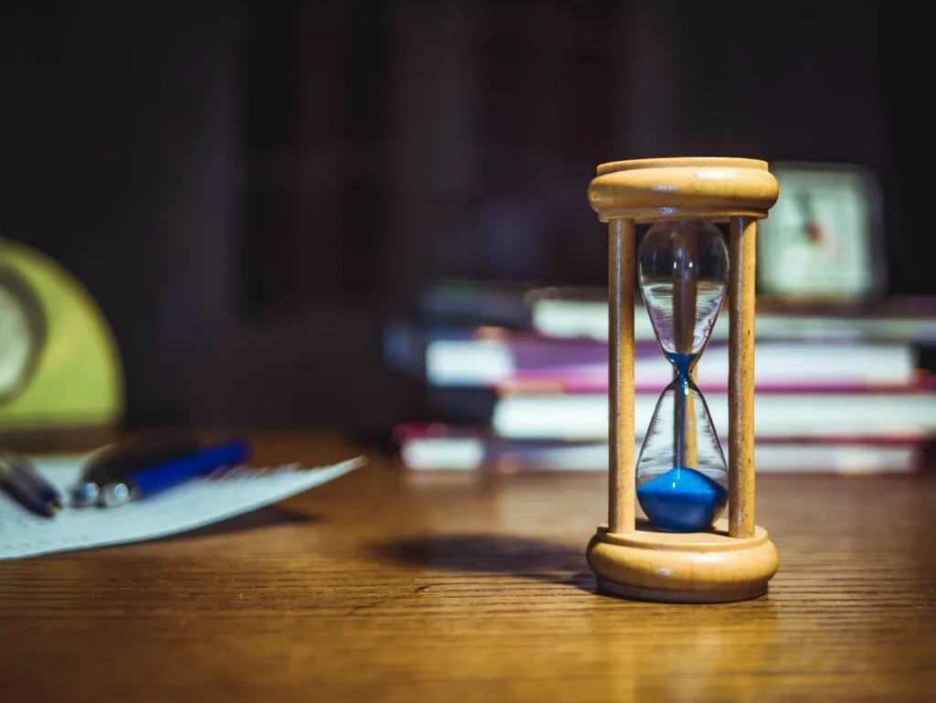 hourglass in close up photography