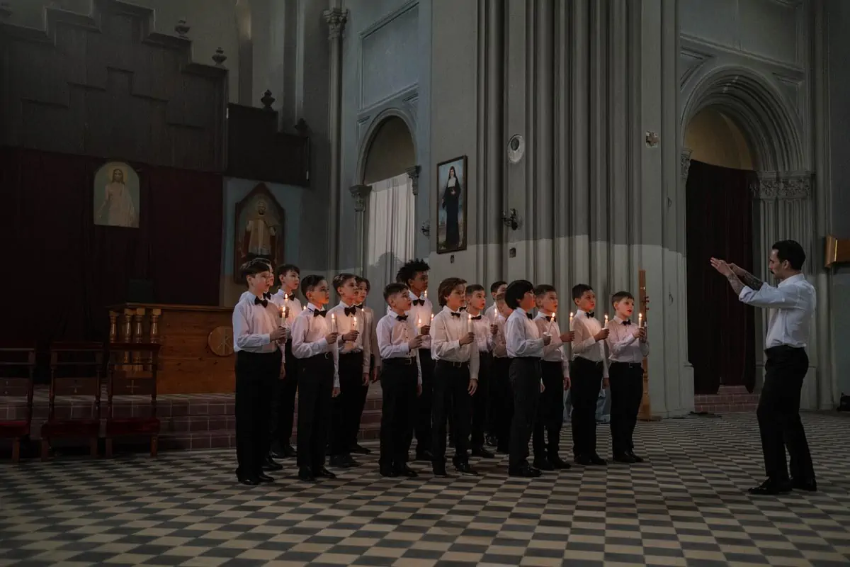 Kids Singing in Front of the Altar