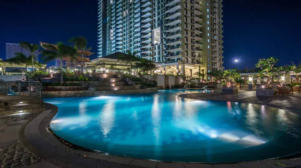 Swimming pool near a condo during the evening