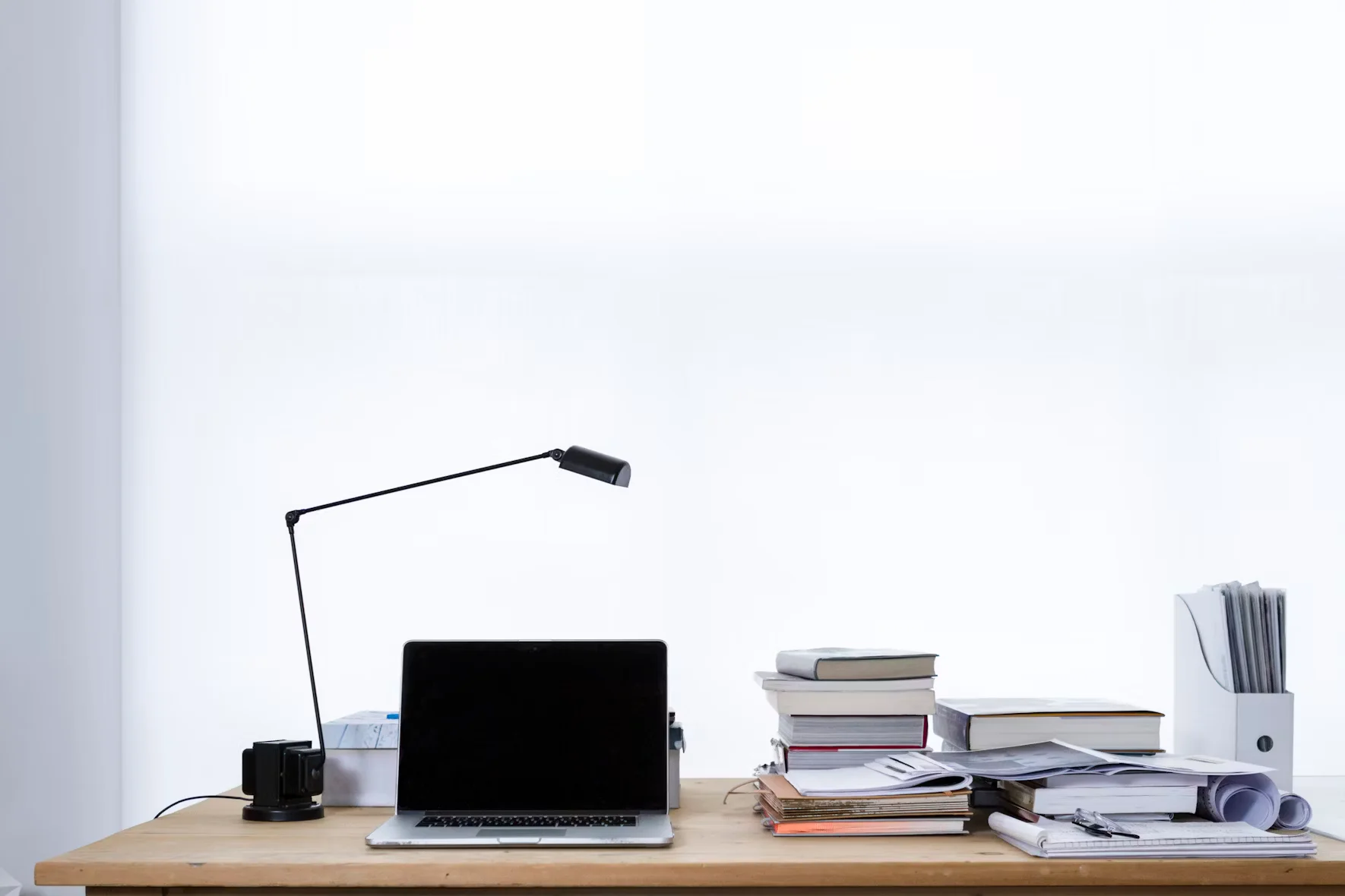 macbook pro on top of table