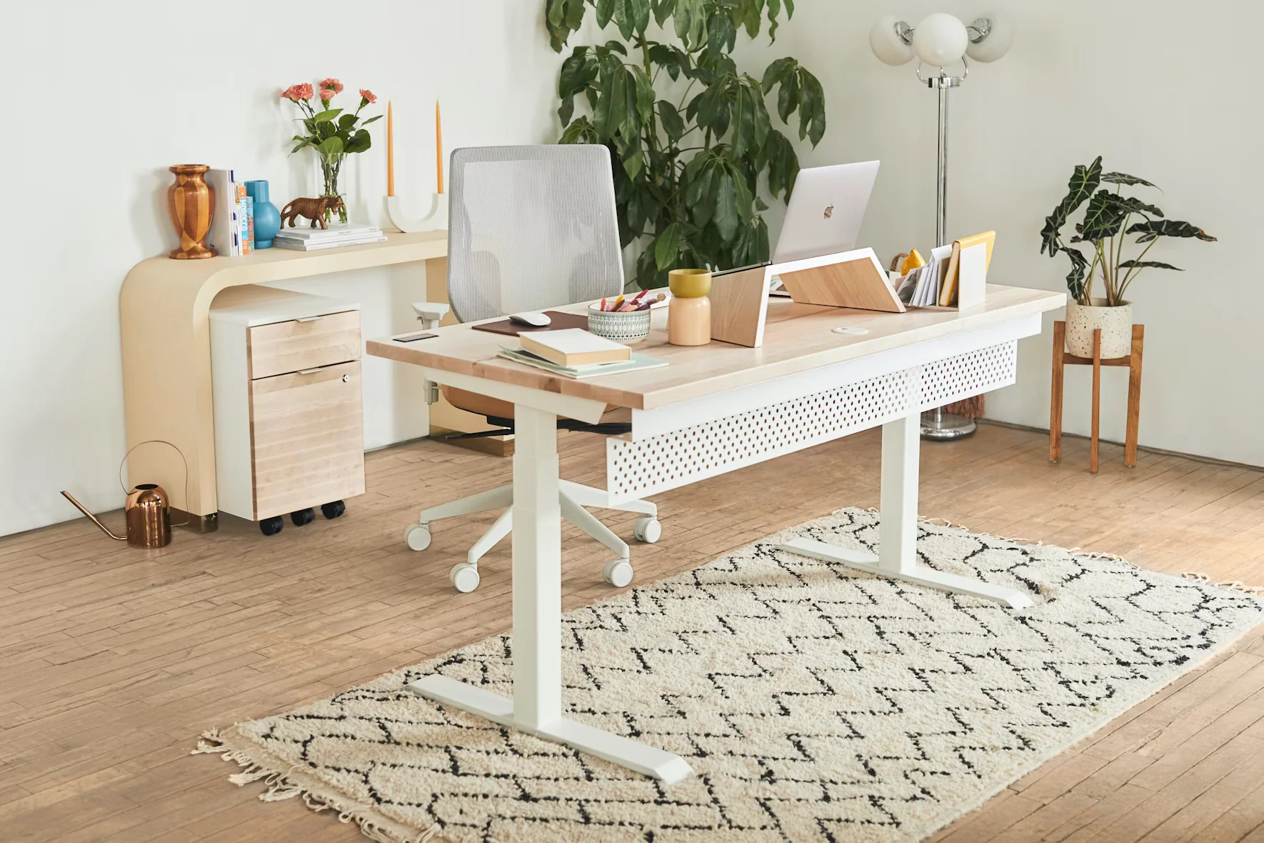 white desk with a laptop