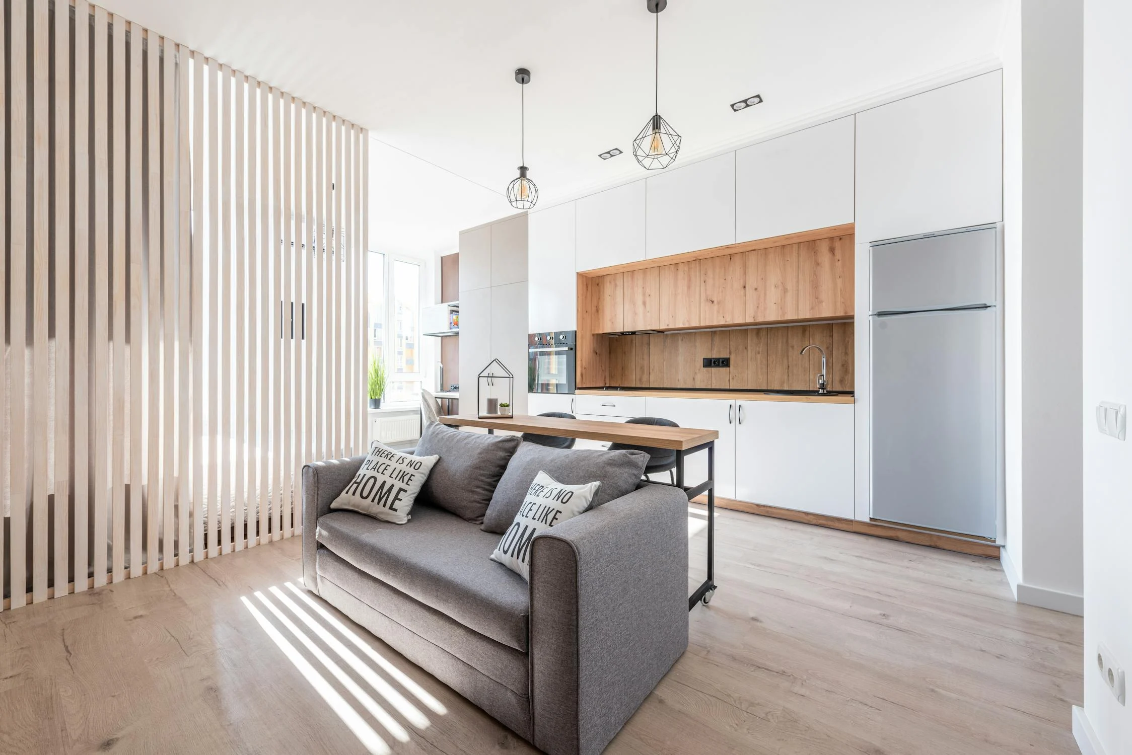 cozy sofa with pillows in modern lounge