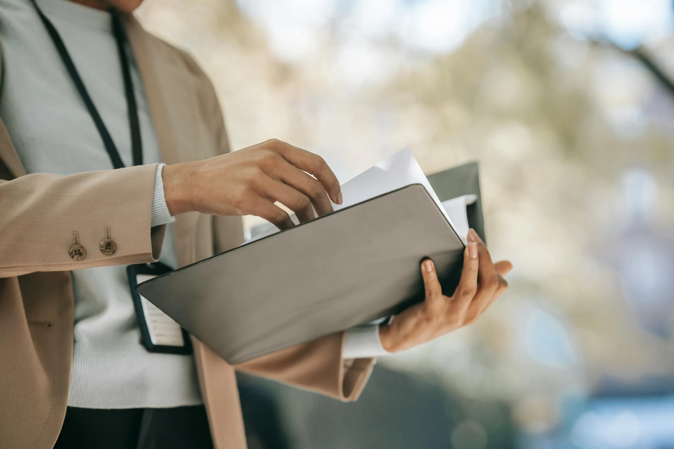 businesswoman with folder with documents