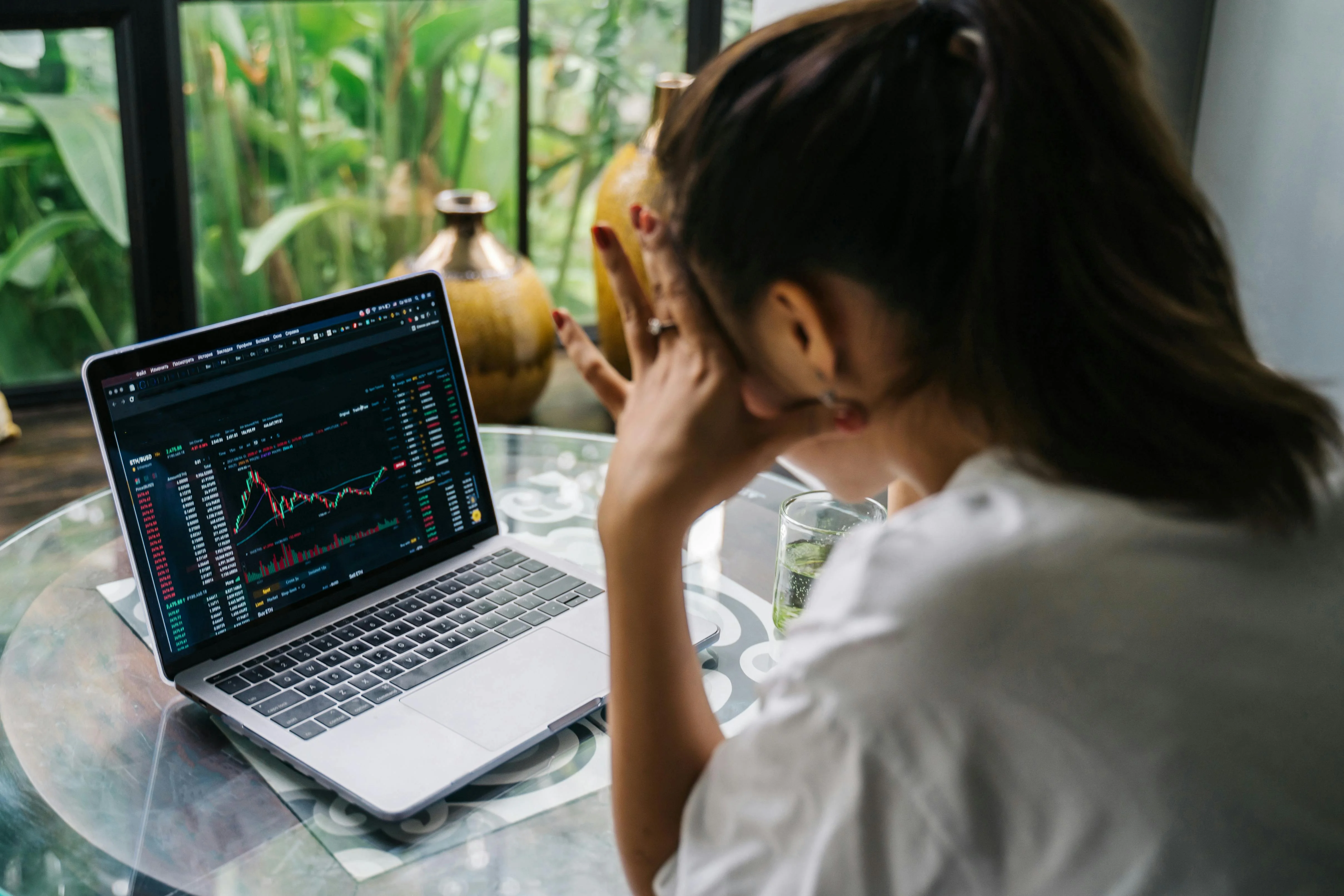 woman looking at her laptop