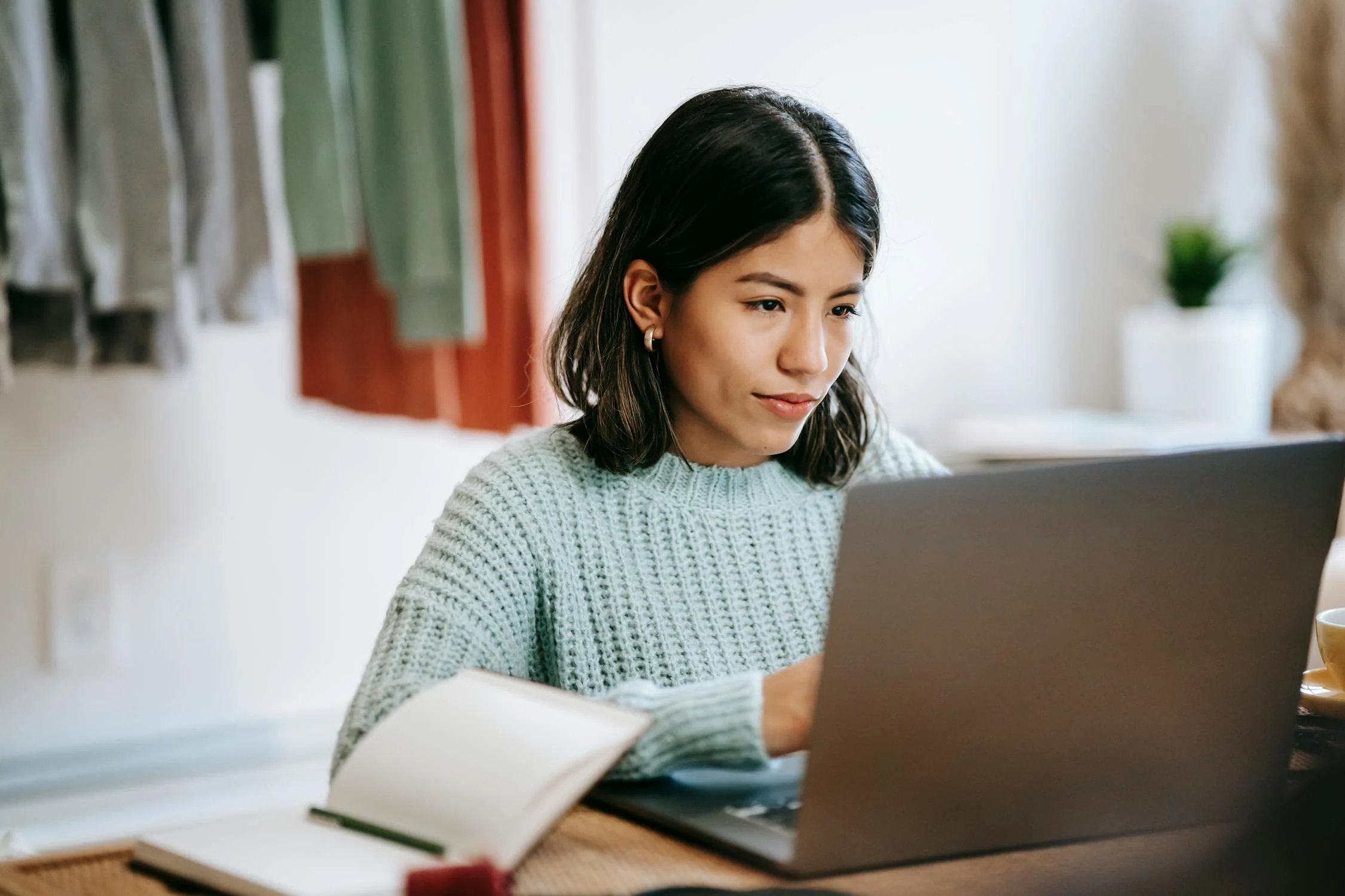 woman working remotely on netbook