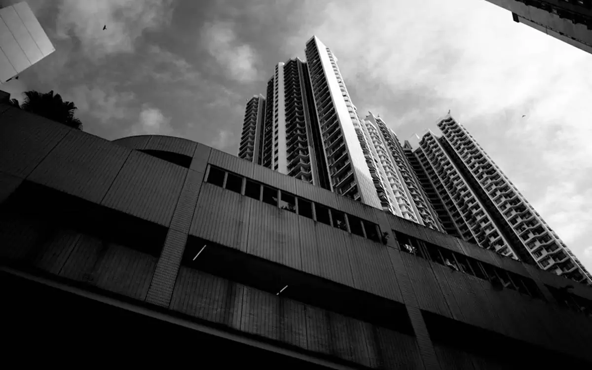 a-black-and-white-photo-of-tall-buildings