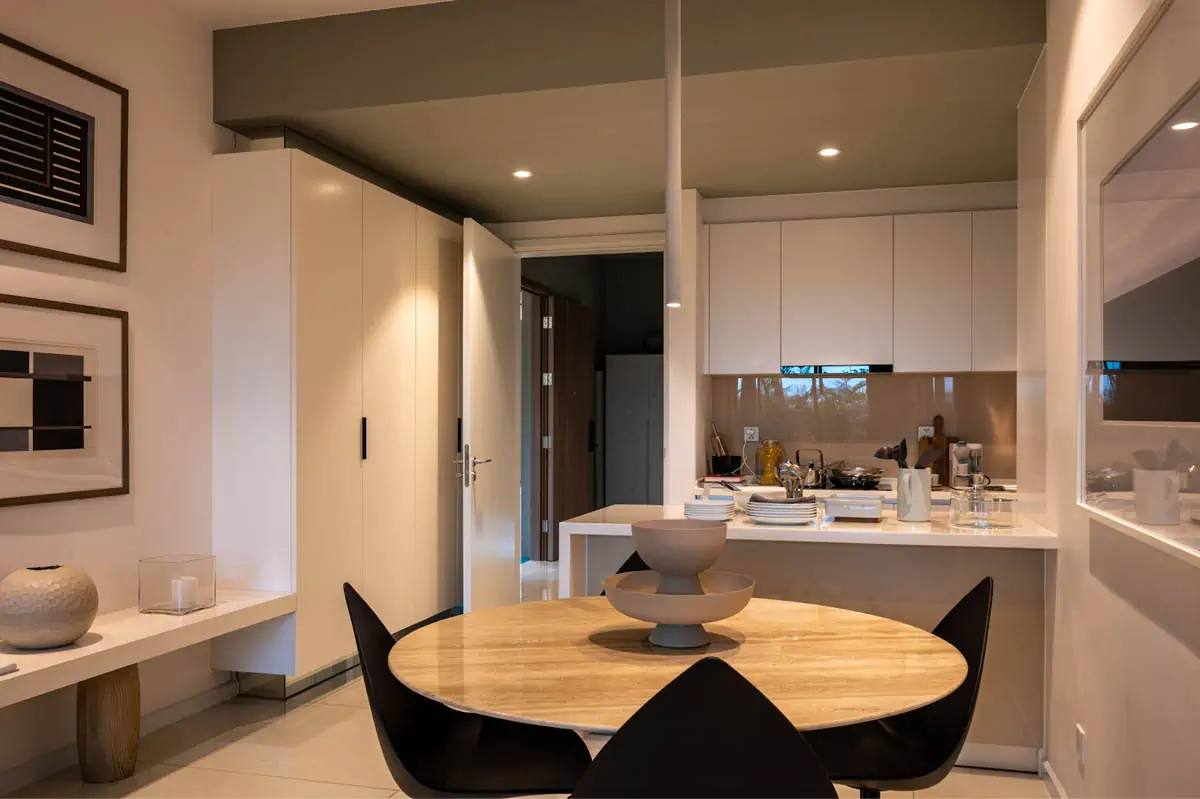 white-ceramic-sink-near-brown-wooden-table