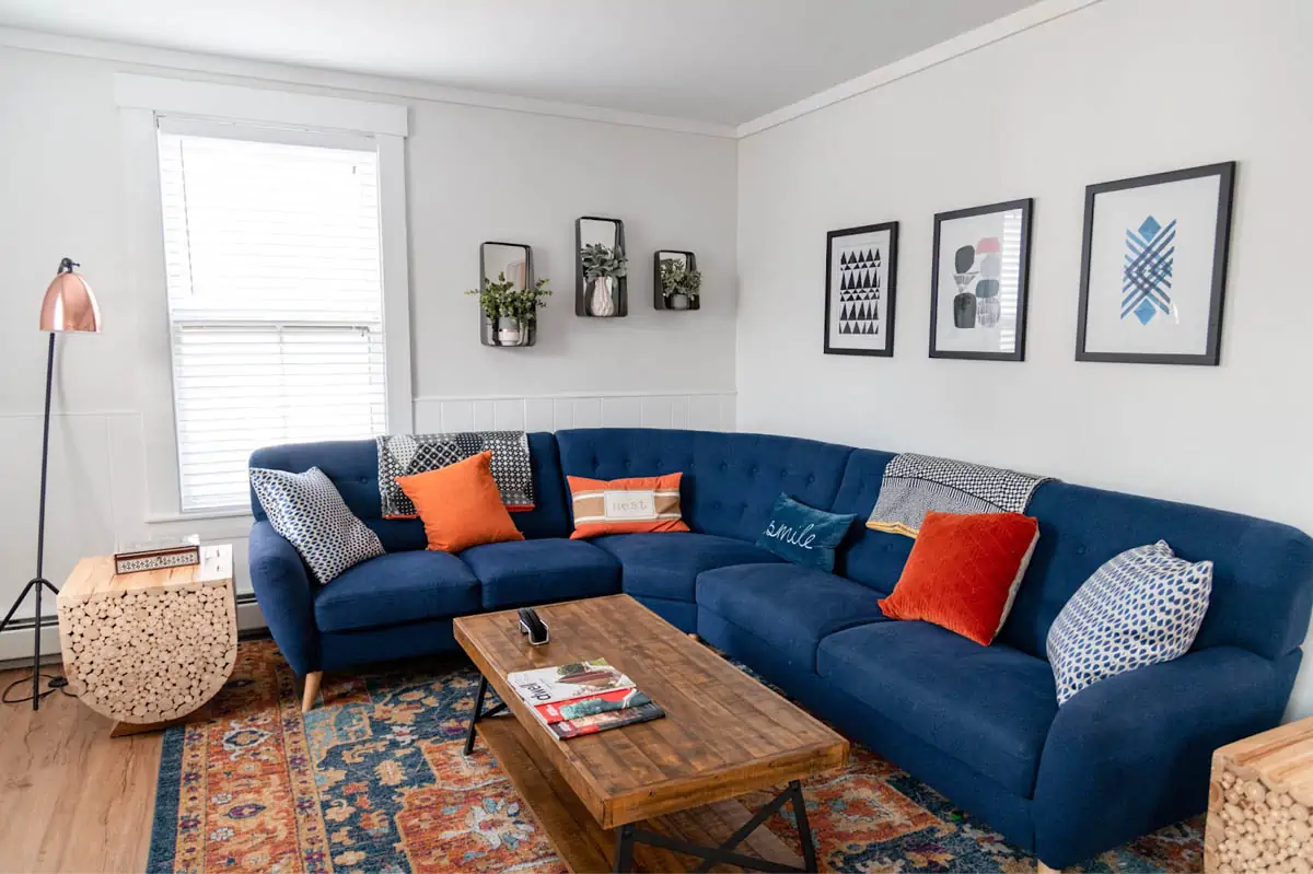 blue-and-brown-couch-with-throw-pillows