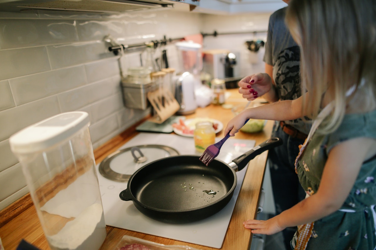 child frying pan girl