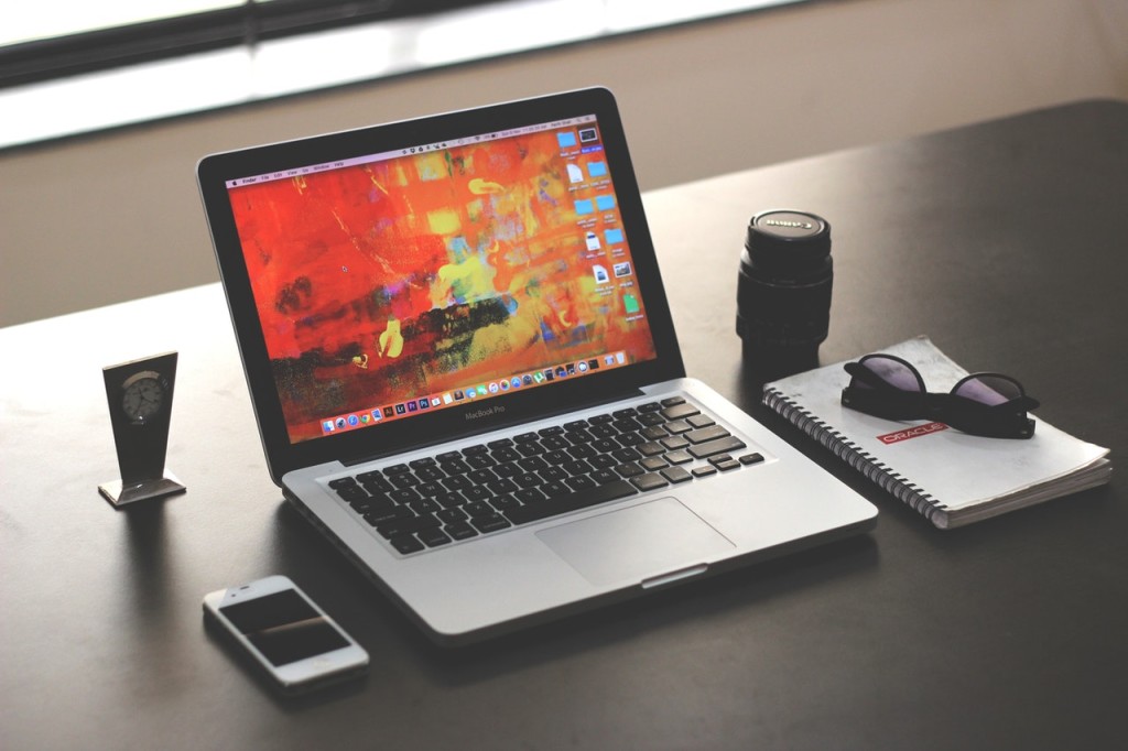 desk macbook pro apple notebook